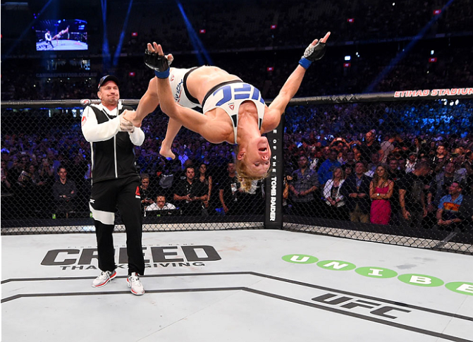 Holly Holm celebrates after upsetting Ronda Rousey at UFC 193. (Photo credit Getty Images via UFC.com)